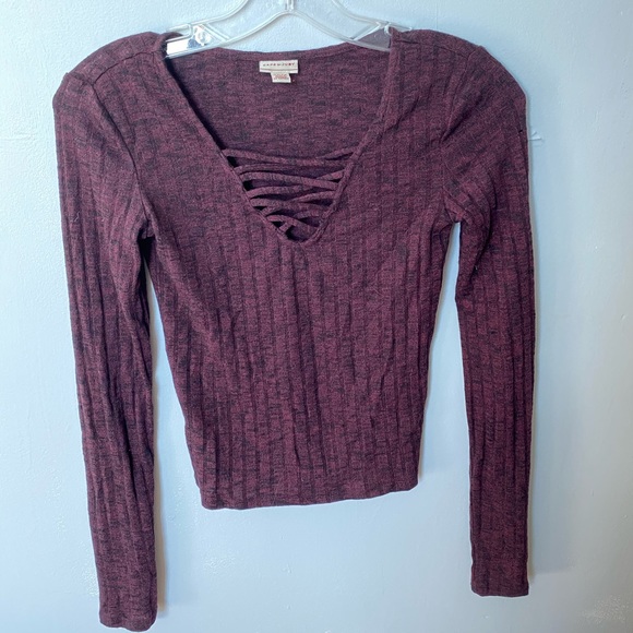 Cape Juby Tops - Maroon long sleeve. Detailed chest.